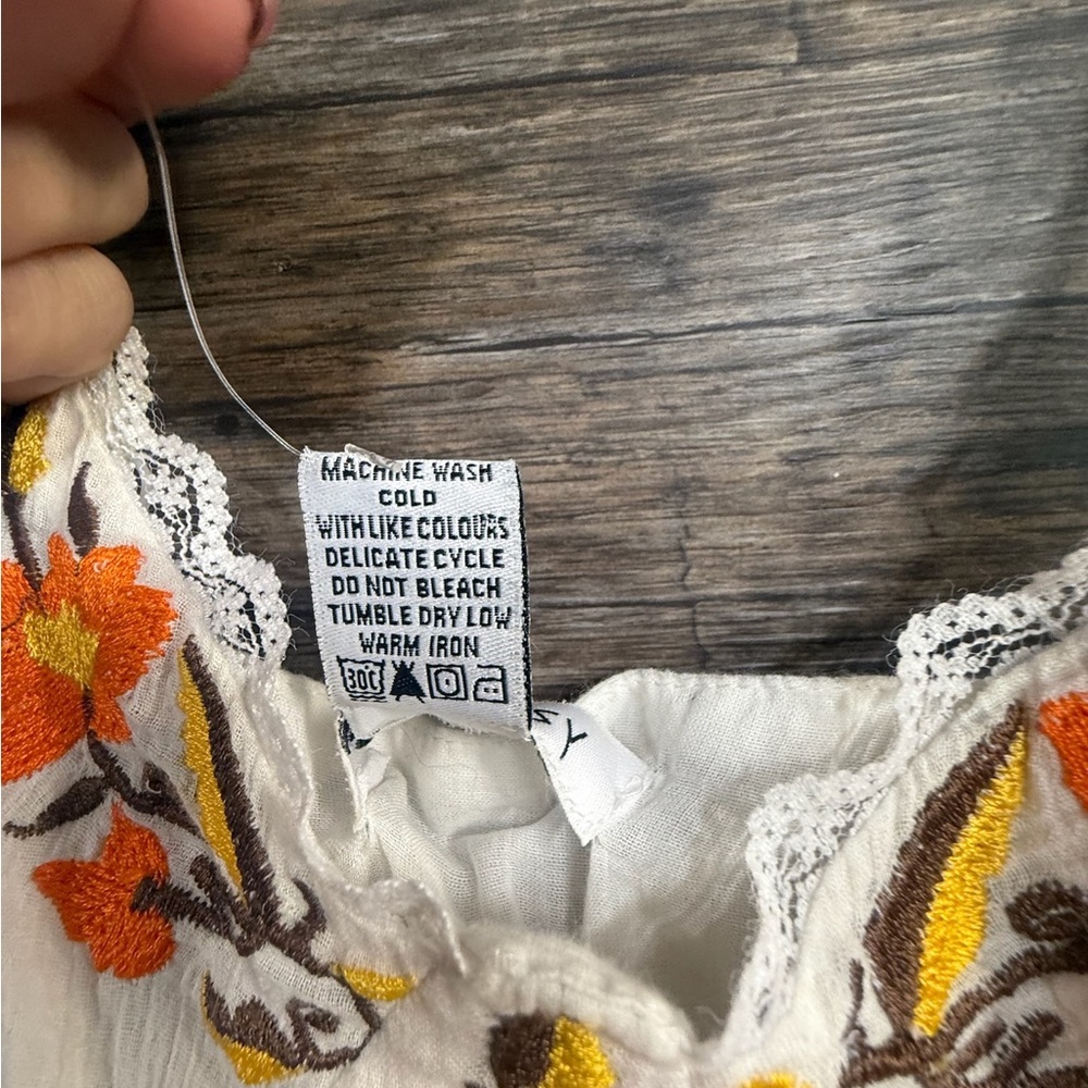 Elegant White Midi Dress with Orange Floral Accents - Picture 6 of 8